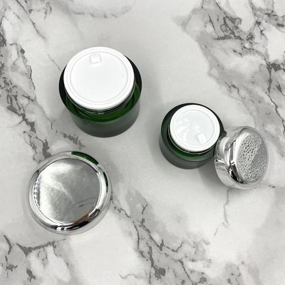 عبوات مستحضرات التجميل الصديقة للبيئة الخضراء 50g 100g الجرار الممعدنة لمنتجات العناية بالبشرة